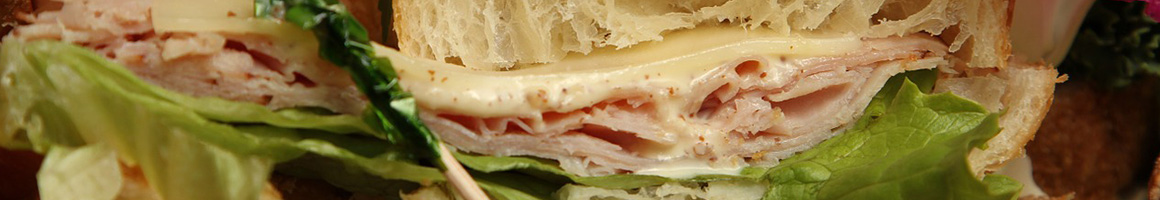 Eating Sandwich at East Coast Super Subs restaurant in Tucson, AZ.